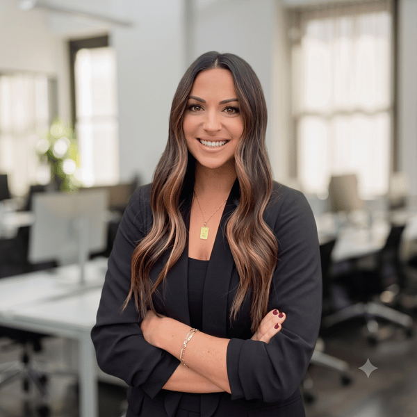 Headshot of Jessica Murphy with empty office environment in background.
